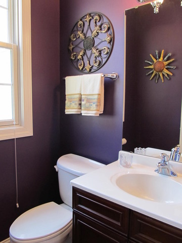 9398 Oak Ridge Drive Rochelle, IL 61068 - Photo 15 of 25 a bathroom with a sink a toilet and a mirror