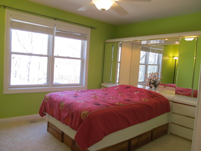 9398 Oak Ridge Drive Rochelle, IL 61068 - Photo 20 of 25 a bedroom with a bed and window
