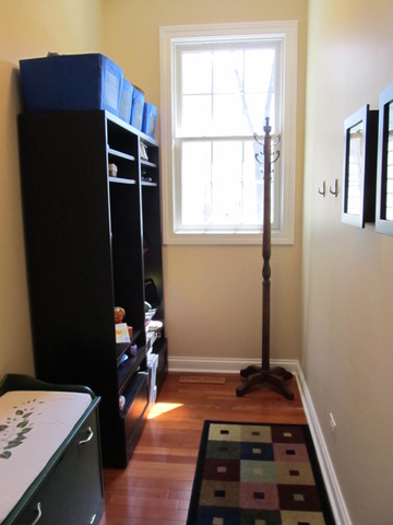 9398 Oak Ridge Drive Rochelle, IL 61068 - Photo 21 of 25 a bedroom with a bed and a window