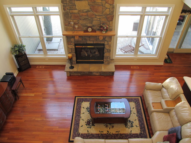 9398 Oak Ridge Drive Rochelle, IL 61068 - Photo 3 of 25 a living room with furniture and a fireplace