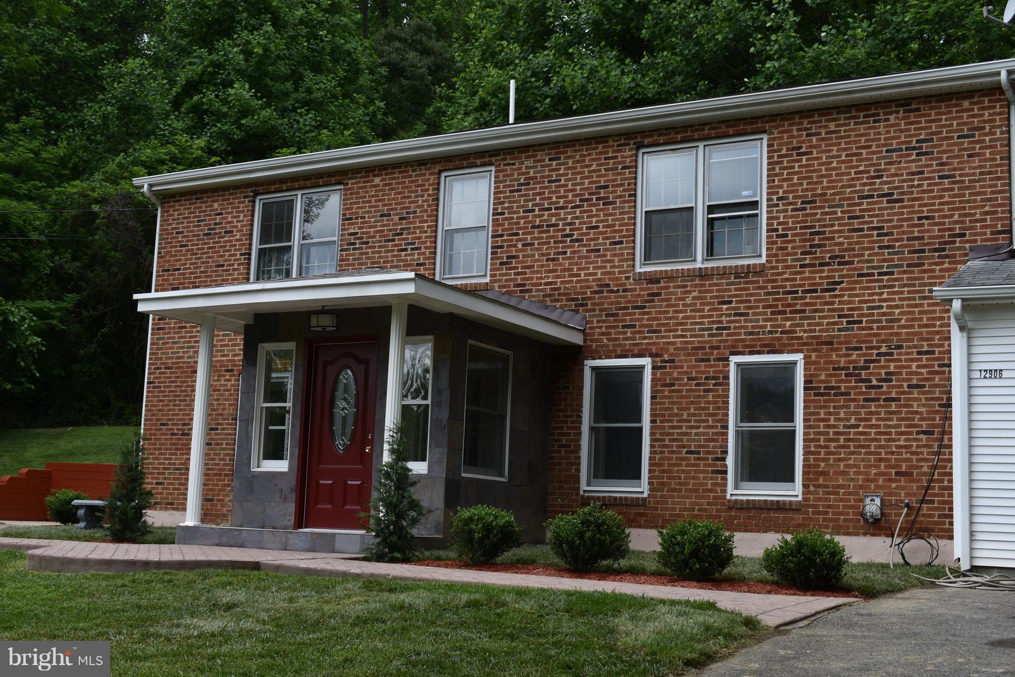 12906 Fletchertown Road Bowie, MD 20720 - Photo 2 of 30 EXTERIOR FRONT SIDE VIEW OF SLATE ENTRANCE