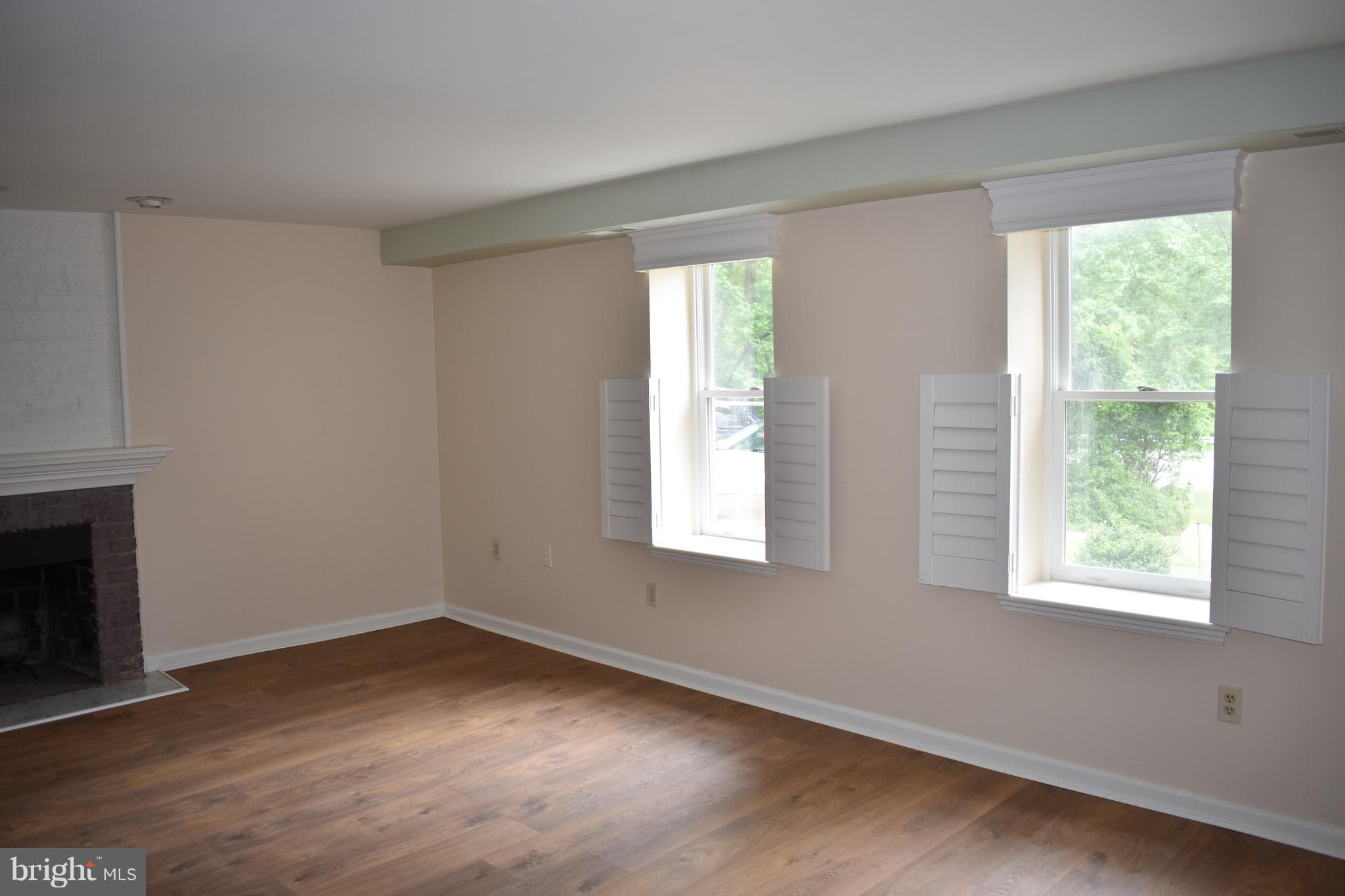 12906 Fletchertown Road Bowie, MD 20720 - Photo 12 of 30 LIVING ROOM WITH FIREPLACE