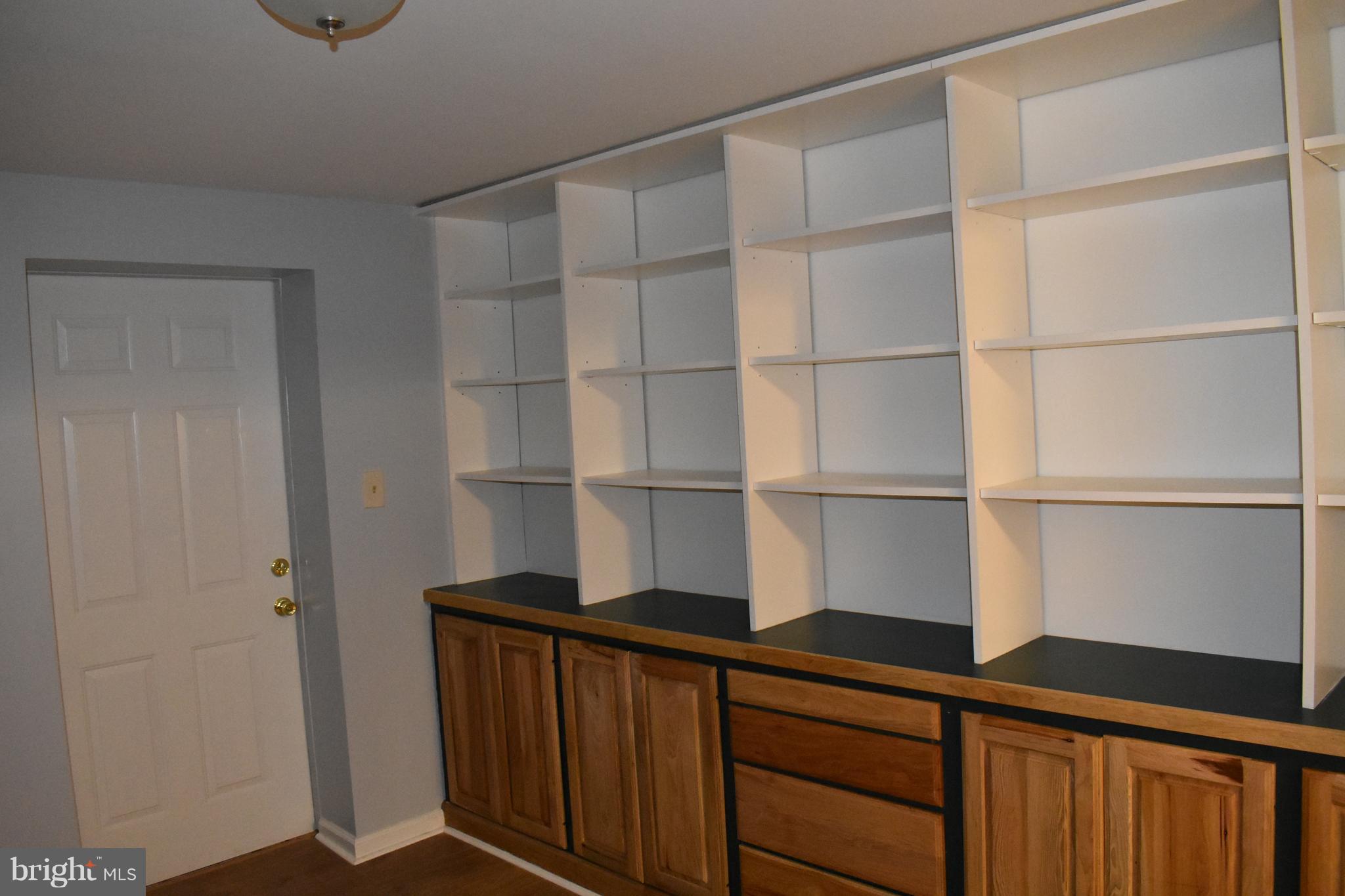 12906 Fletchertown Road Bowie, MD 20720 - Photo 13 of 30 FIRST FLOOR OFFICE WITH BUILD IN SHELVES