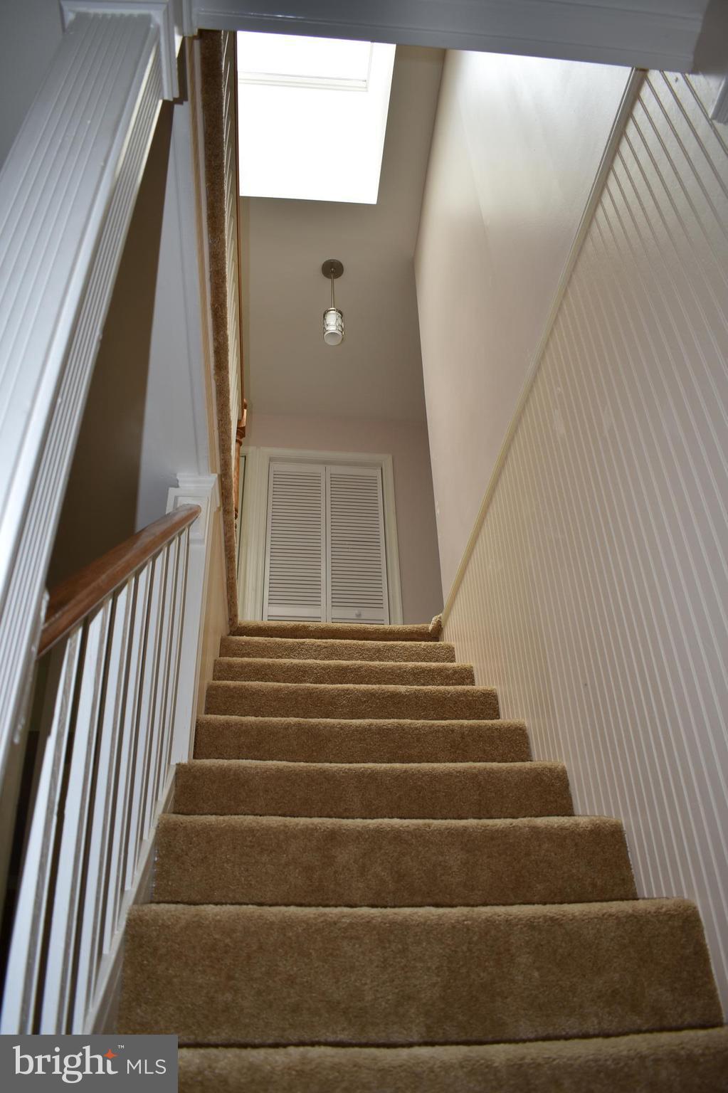 12906 Fletchertown Road Bowie, MD 20720 - Photo 16 of 30 STAIRS TO 2ND FLOOR WITH SKYLIGHT