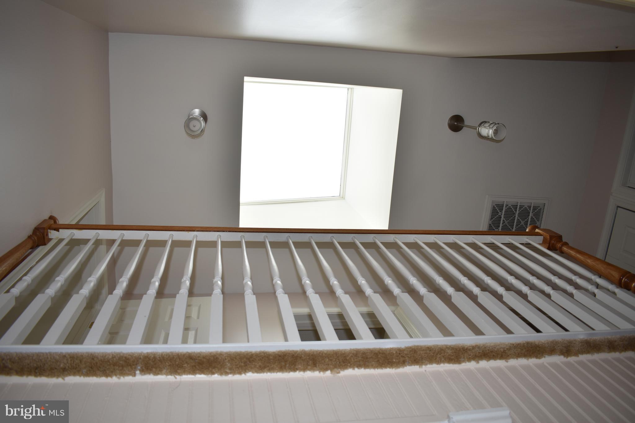 12906 Fletchertown Road Bowie, MD 20720 - Photo 17 of 30 SKYLIGHT ABOVE STAIRS