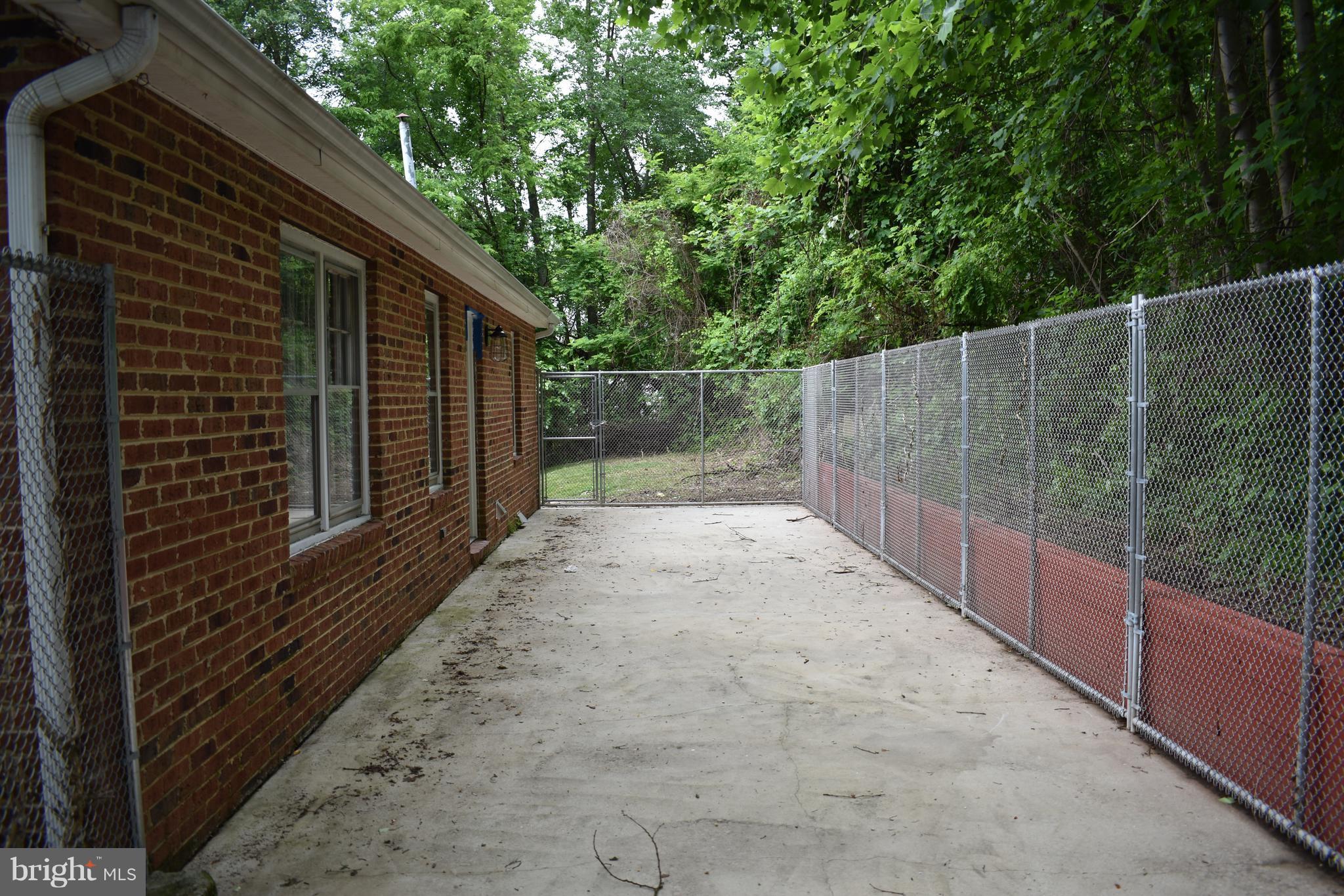 12906 Fletchertown Road Bowie, MD 20720 - Photo 28 of 30 FENCED IN BACK PATIO