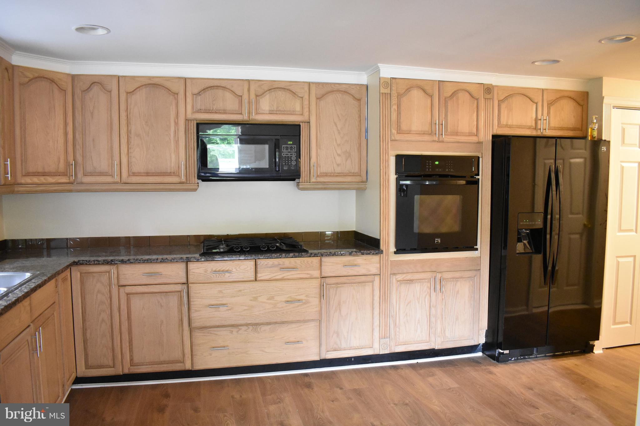 12906 Fletchertown Road Bowie, MD 20720 - Photo 6 of 30 LARGE KITCHEN OPEN TO DINING ROOM