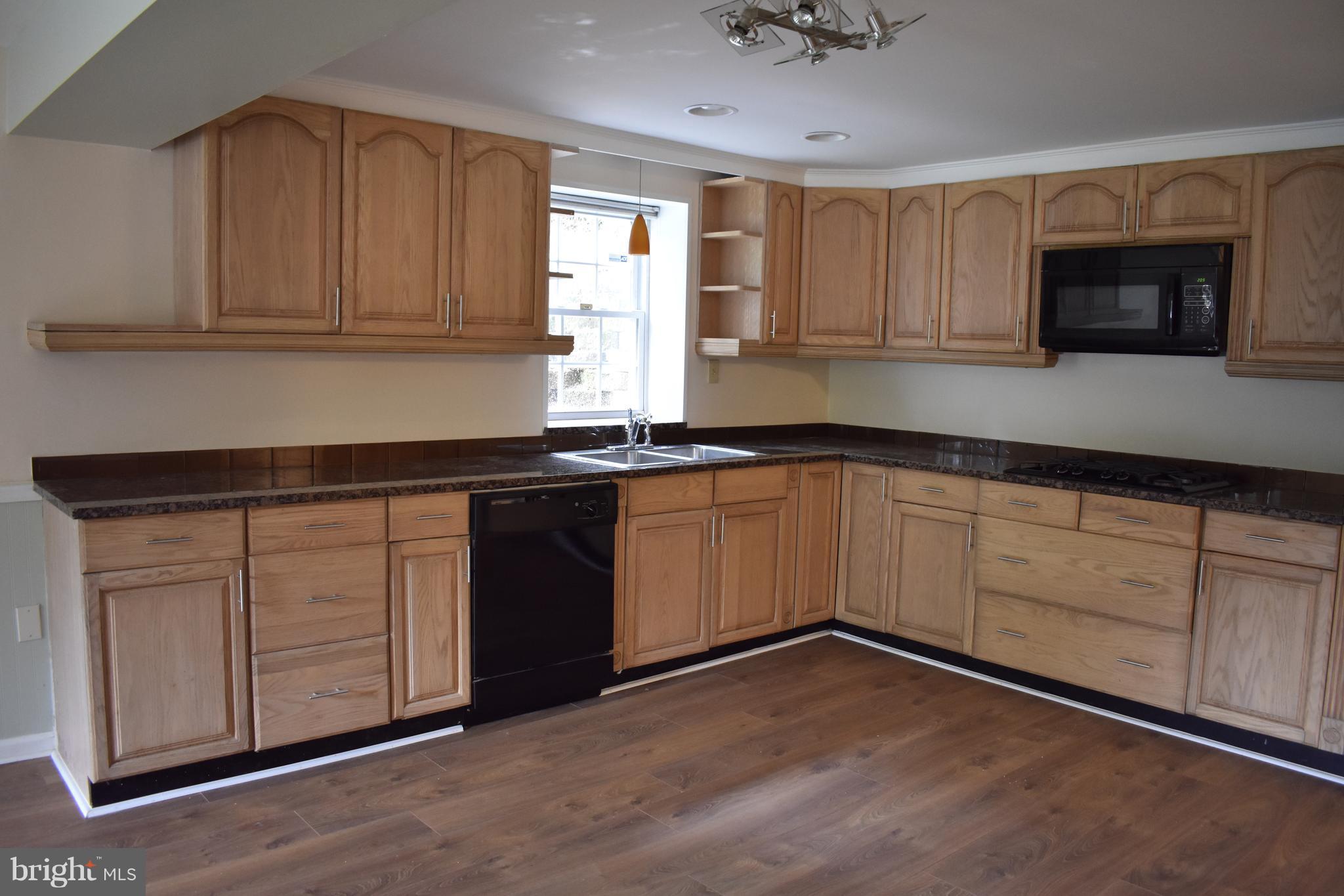 12906 Fletchertown Road Bowie, MD 20720 - Photo 7 of 30 LARGE KITCHEN OPEN TO DINING ROOM