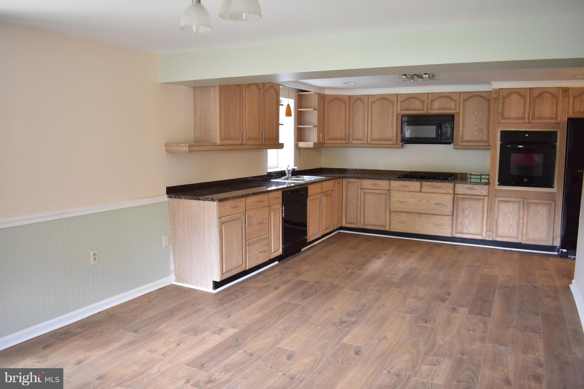 12906 Fletchertown Road Bowie, MD 20720 - Photo 8 of 30 LARGE KITCHEN OPEN TO DINING ROOM