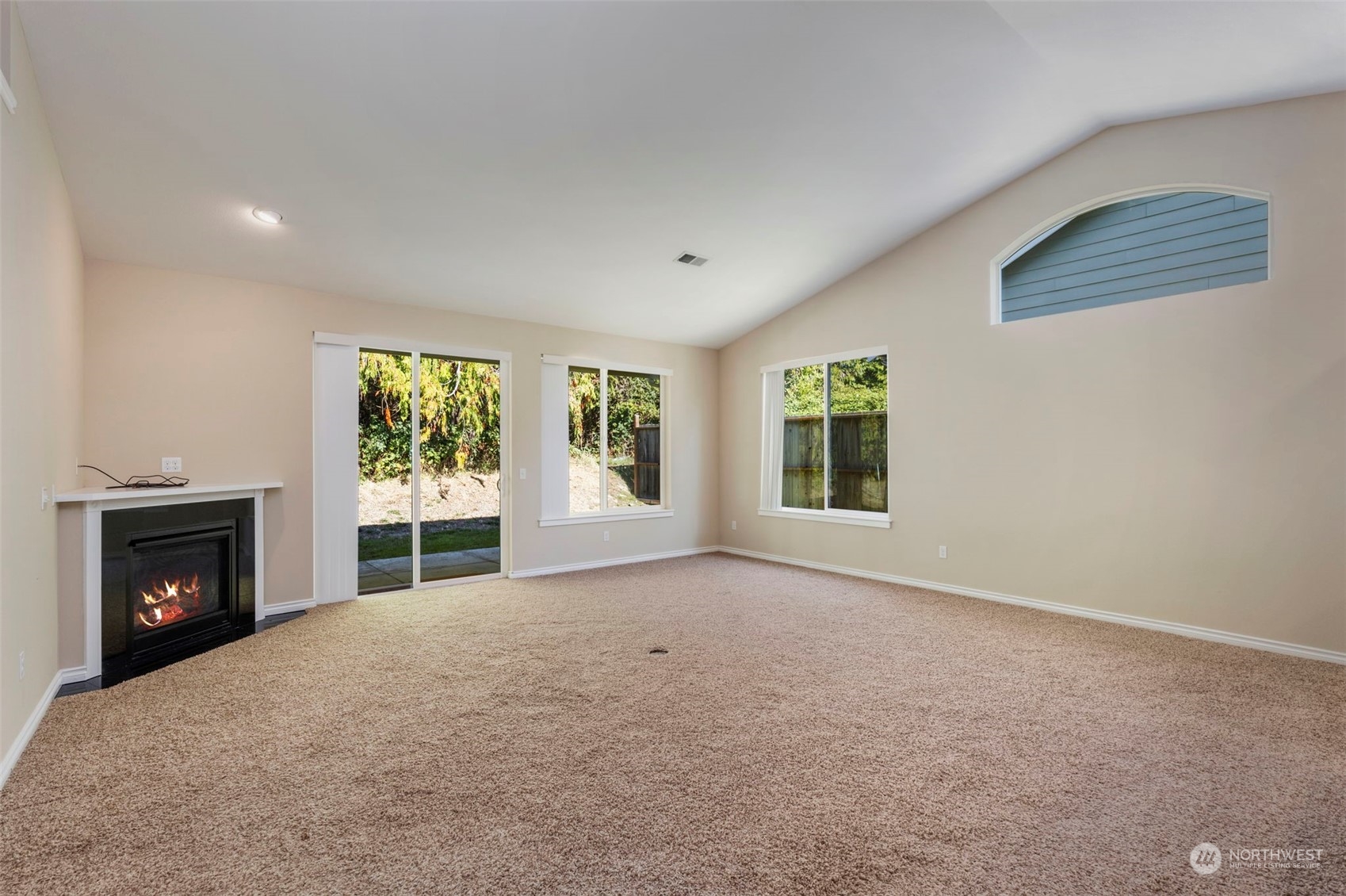 71 Pinehurst Loop Sequim, WA 98382 - Photo 4 of 32 a view of empty room with a fireplace