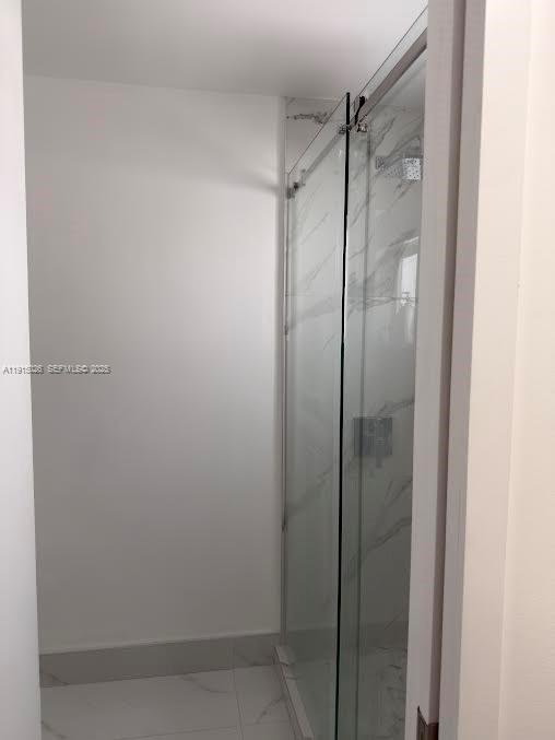 733 Southwest 99th Ct Circle Miami, FL 33174 - Photo 13 of 16 a bathroom with a glass shower door