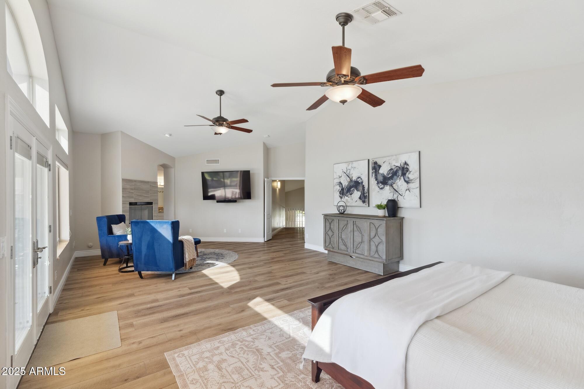 1321 West Shellfish Drive Gilbert, AZ 85233 - Photo 12 of 65 a bedroom with a bed and a couch