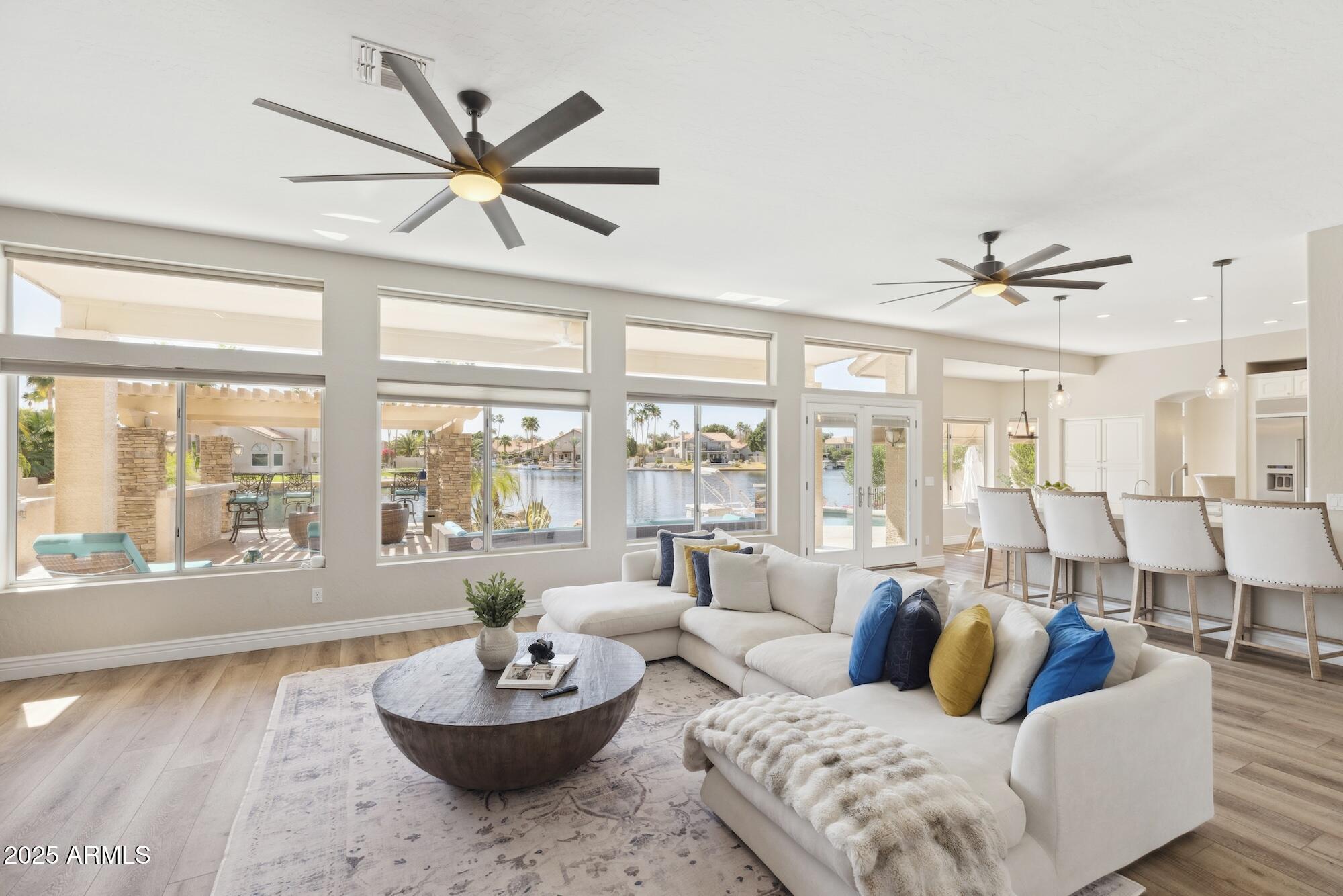 1321 West Shellfish Drive Gilbert, AZ 85233 - Photo 50 of 65 a living room with furniture and a large window