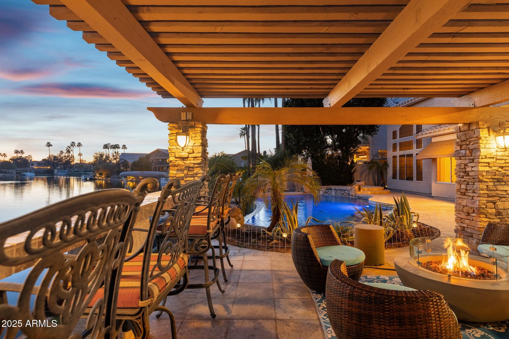 1321 West Shellfish Drive Gilbert, AZ 85233 - Photo 60 of 65 a view of swimming pool with outdoor seating and city view