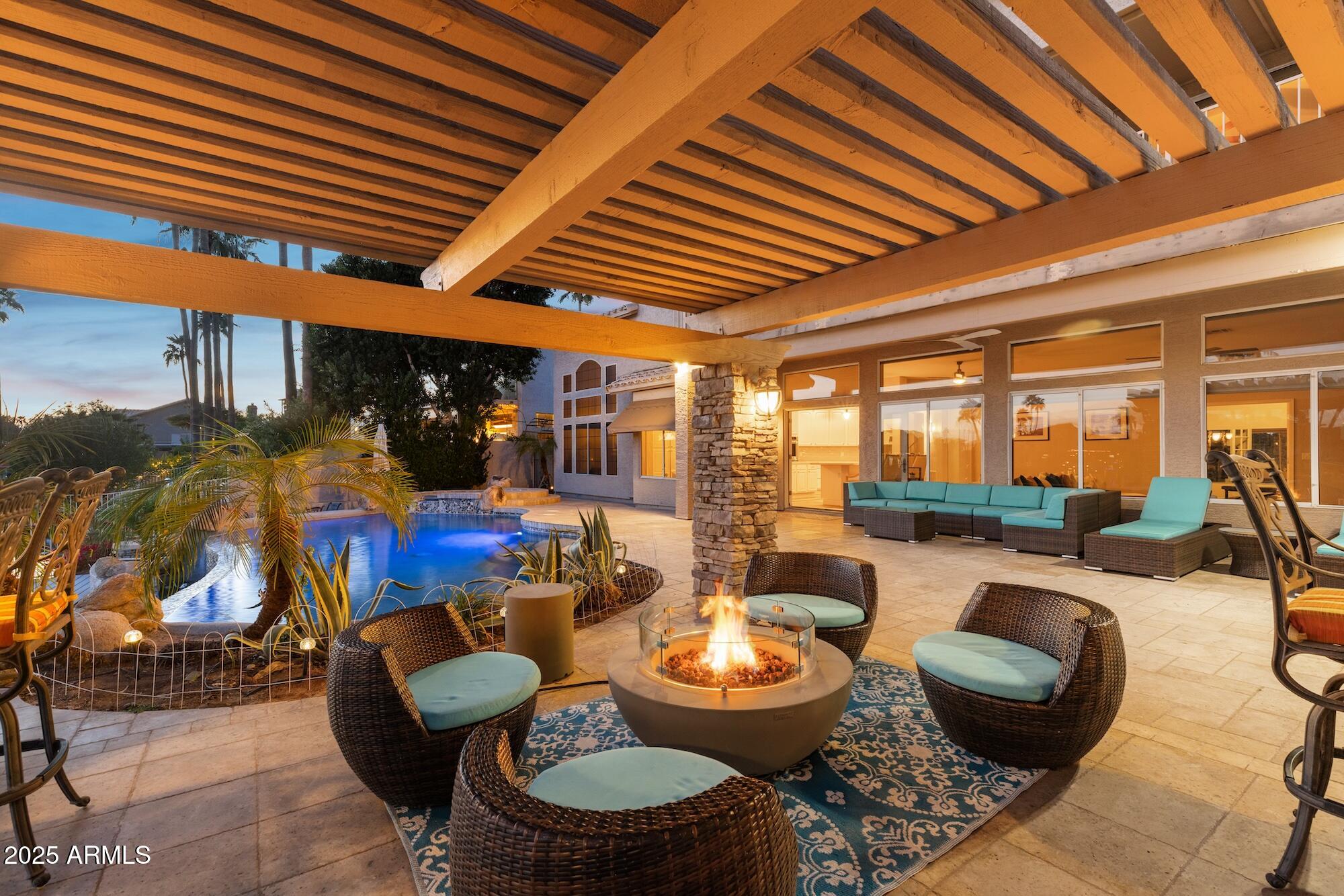 1321 West Shellfish Drive Gilbert, AZ 85233 - Photo 61 of 65 a dining room with furniture and a large window