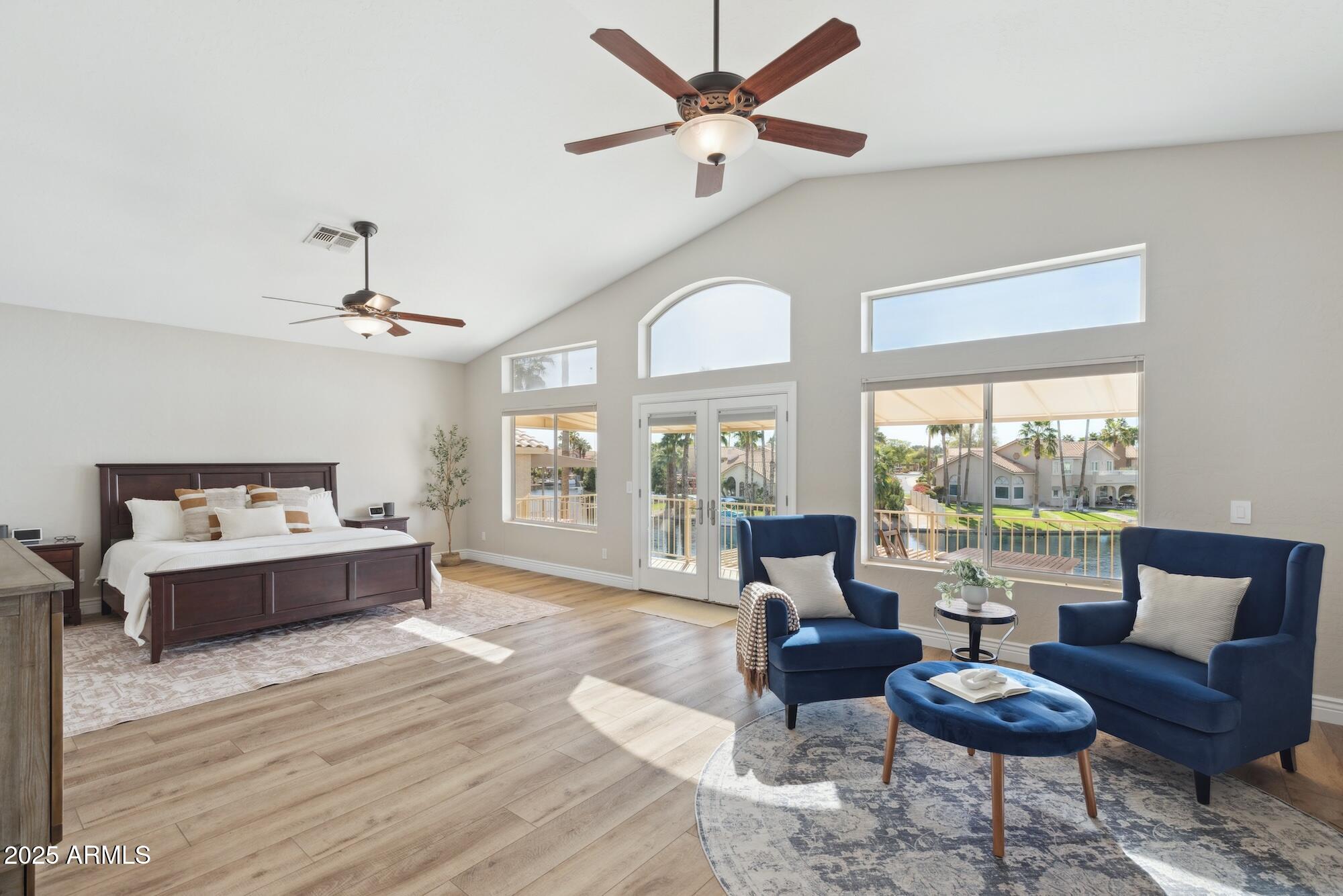1321 West Shellfish Drive Gilbert, AZ 85233 - Photo 9 of 65 a living room with furniture and a large window