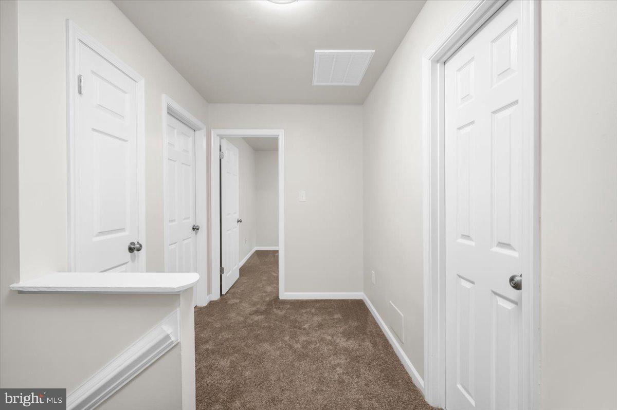 11816 Rutherford Drive Fredericksburg, VA 22407 - Photo 17 of 64 a view of an entryway with wooden floor