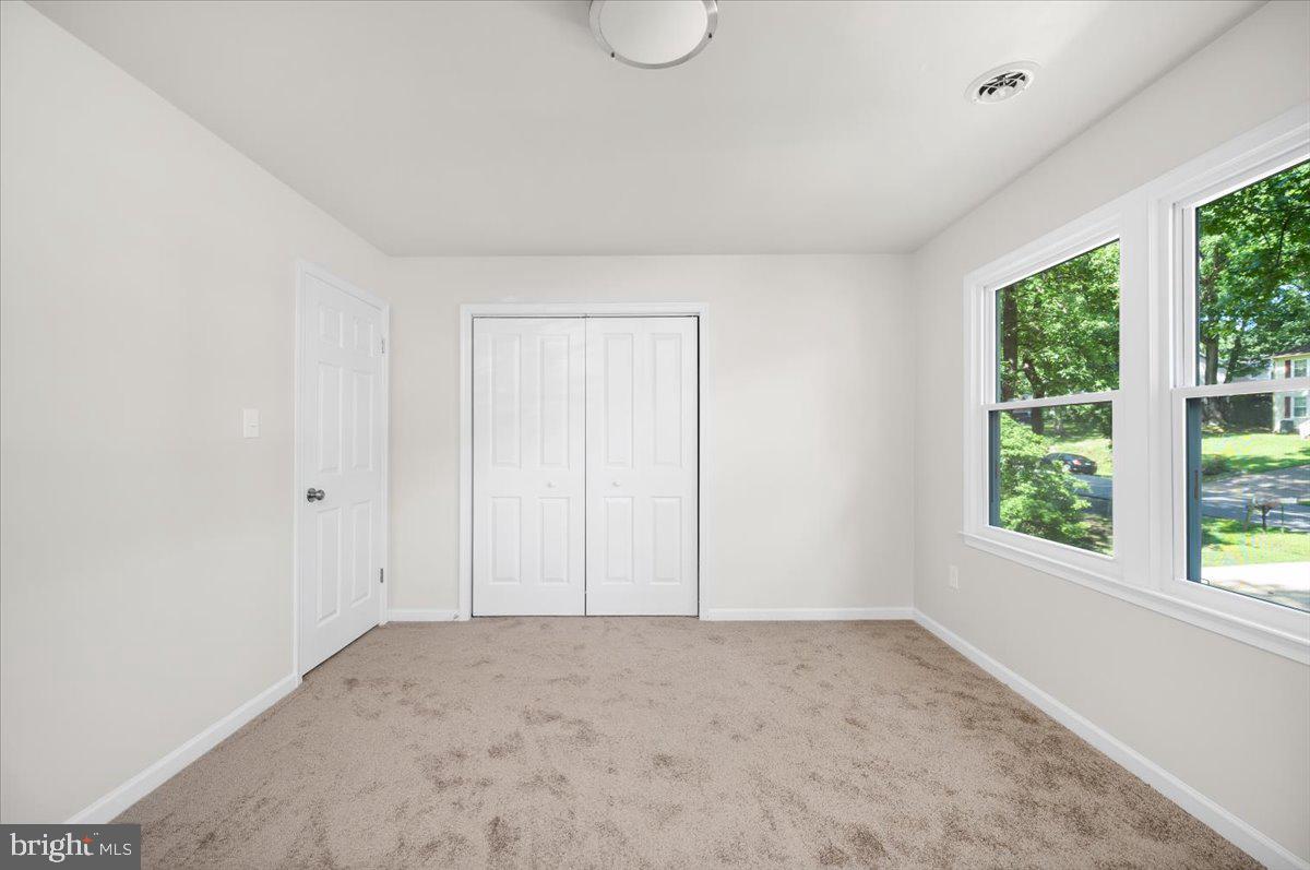 11816 Rutherford Drive Fredericksburg, VA 22407 - Photo 21 of 64 a view of an empty room with a window