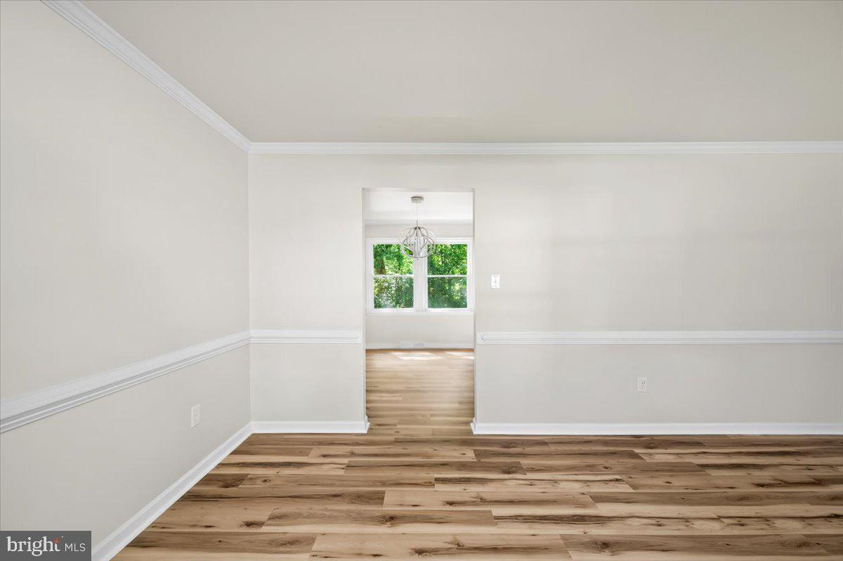 11816 Rutherford Drive Fredericksburg, VA 22407 - Photo 38 of 64 a view of wooden floor and windows in a room