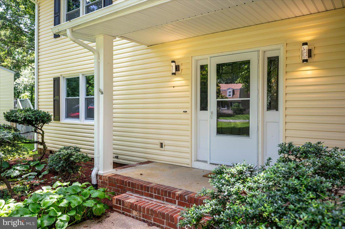 11816 Rutherford Drive Fredericksburg, VA 22407 - Photo 7 of 64 a view of a entryway door front of house