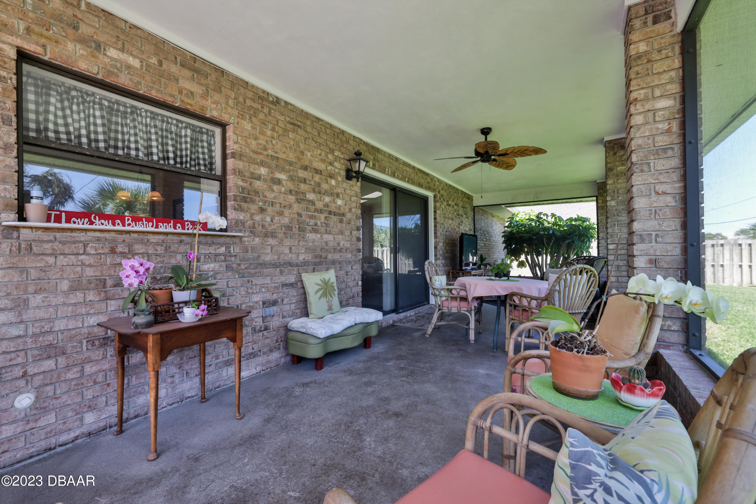 118 Sand Dunes Drive Ormond Beach, FL 32176 - Photo 24 of 46 a outdoor living space with furniture