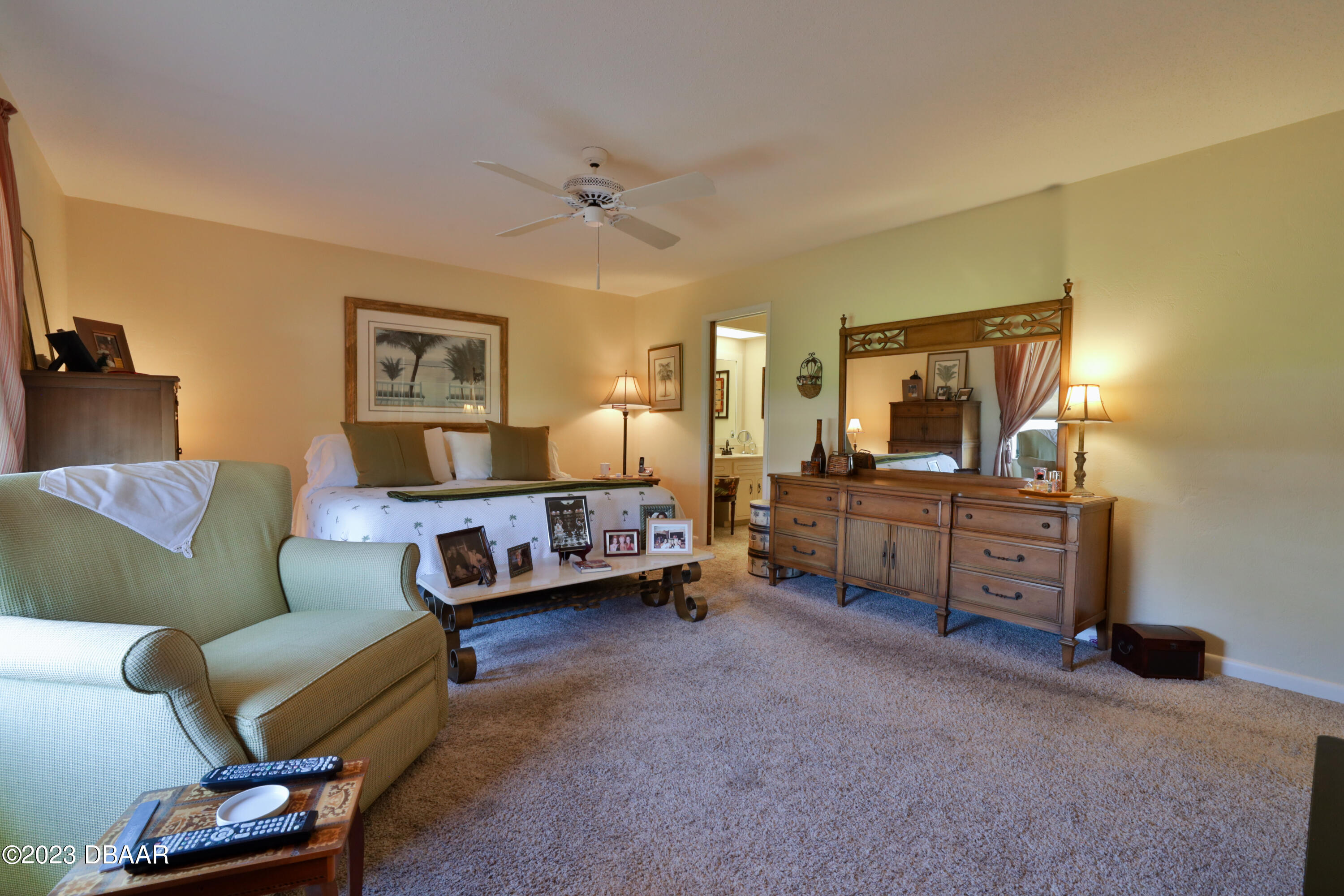 118 Sand Dunes Drive Ormond Beach, FL 32176 - Photo 27 of 46 a living room with furniture and a flat screen tv