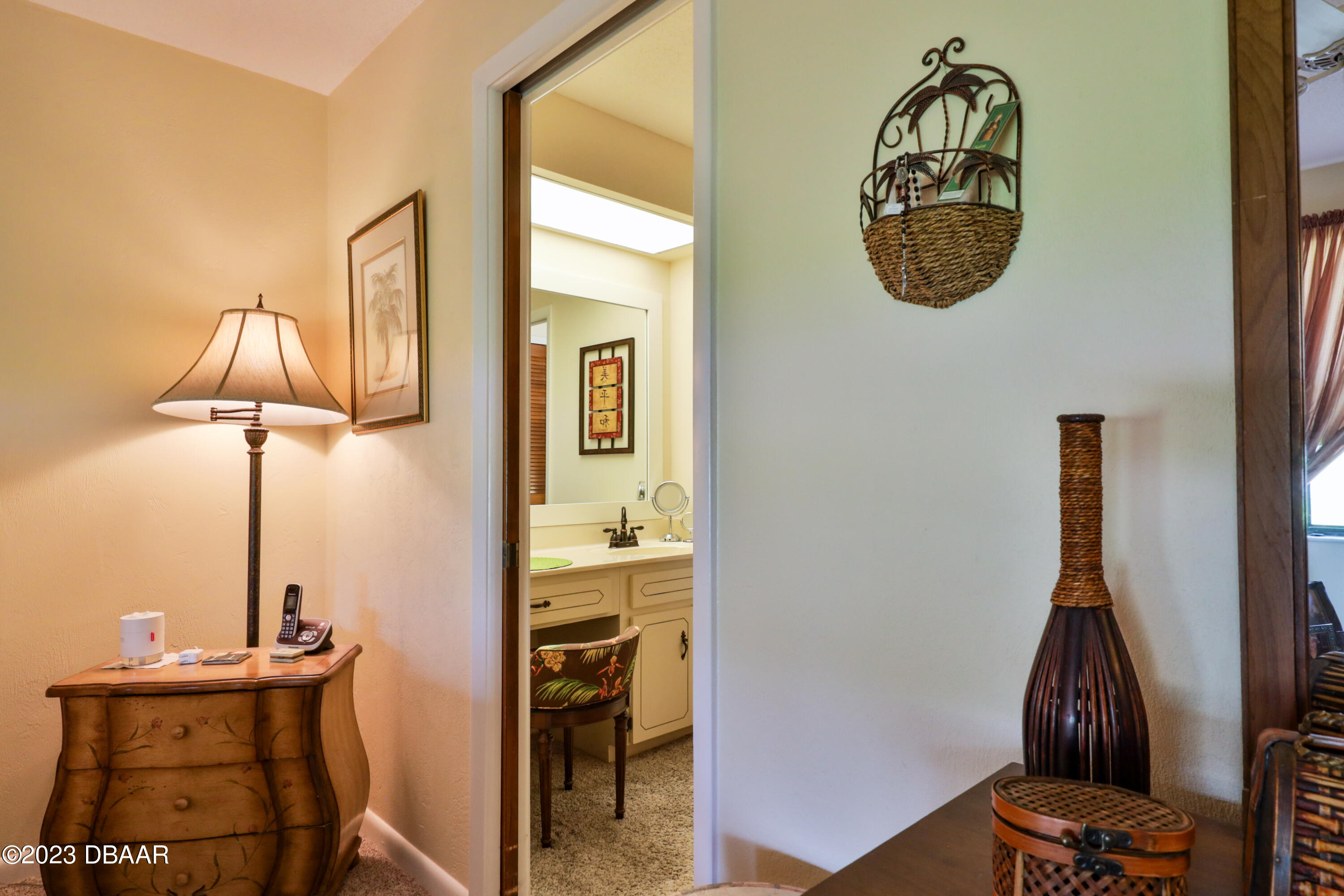 118 Sand Dunes Drive Ormond Beach, FL 32176 - Photo 29 of 46 a view of a room with a mirror and a window