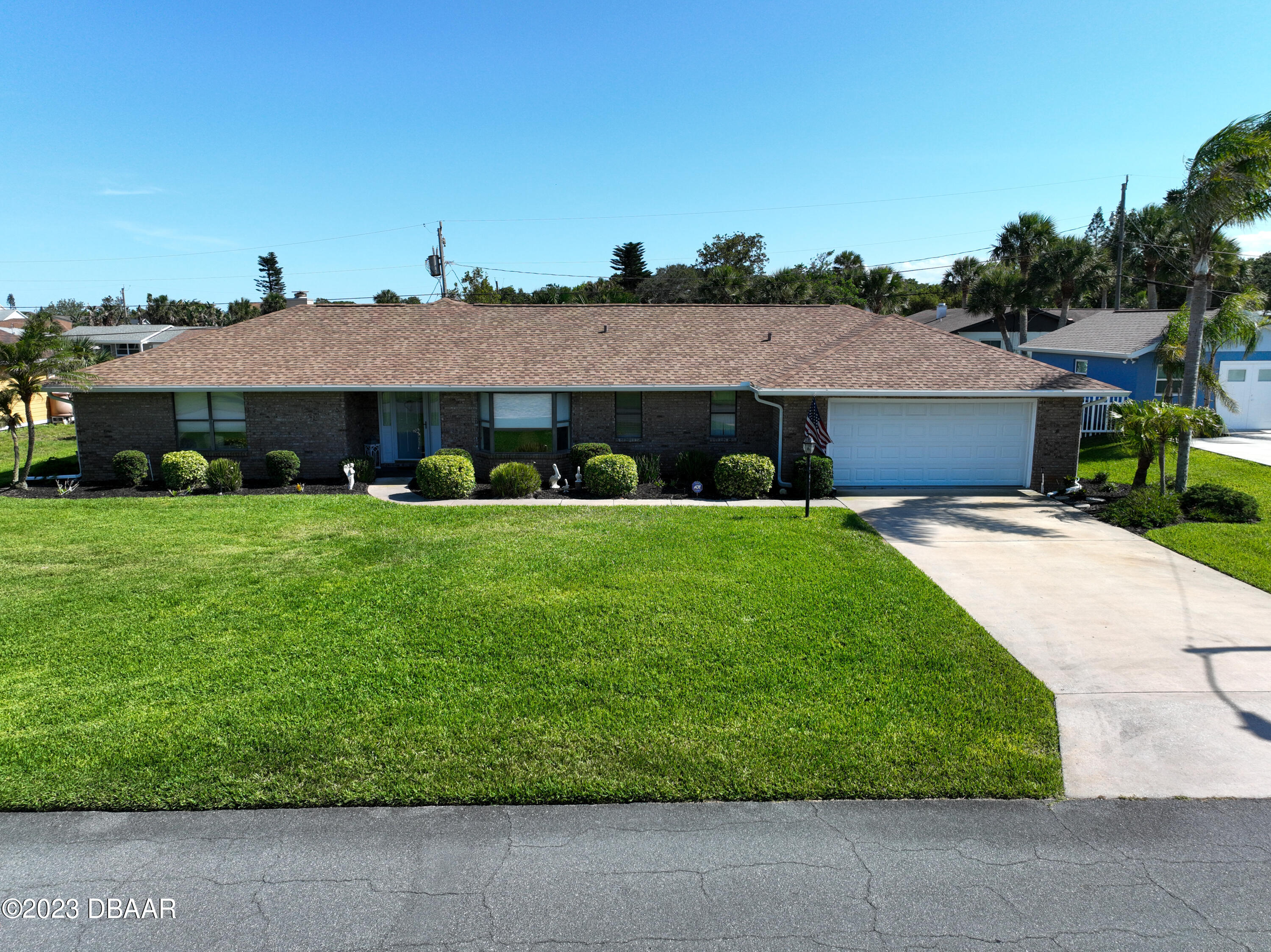 118 Sand Dunes Drive Ormond Beach, FL 32176 - Photo 46 of 46 a front view of a house with garden