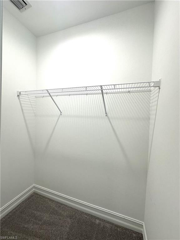 7509 Carnegie Way Naples, FL 34119 - Photo 21 of 33 a view of small space with empty racks on the wall