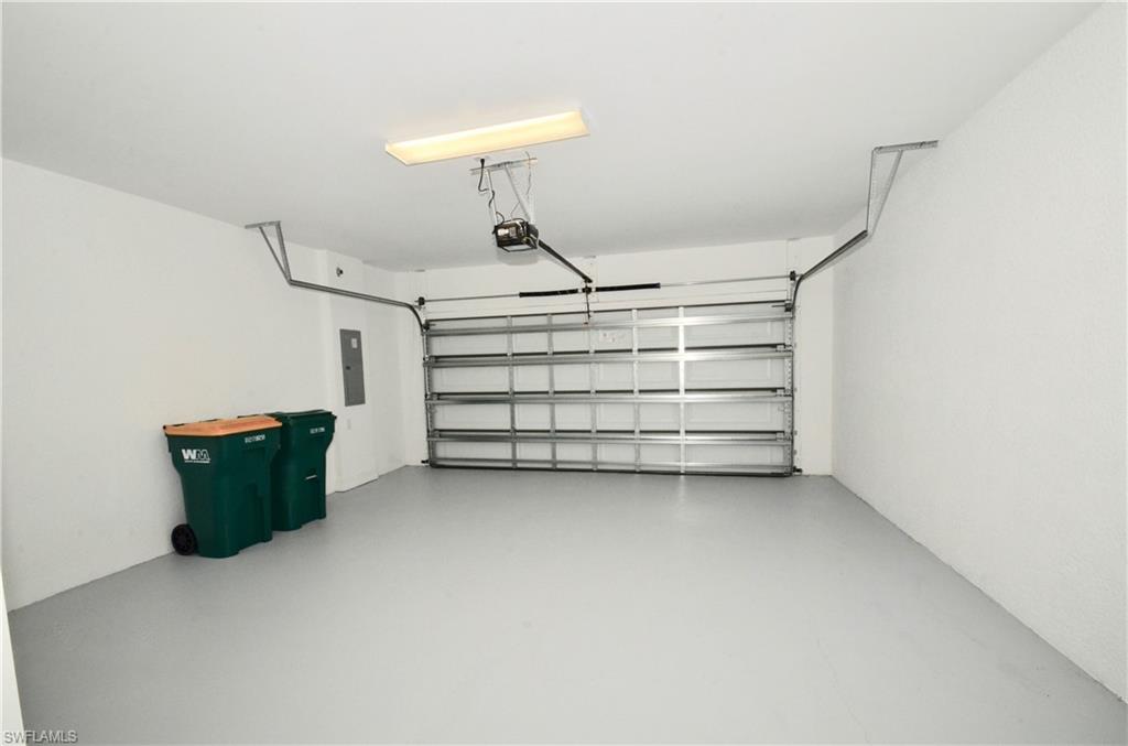 7509 Carnegie Way Naples, FL 34119 - Photo 26 of 33 a view of a room with storage and utility