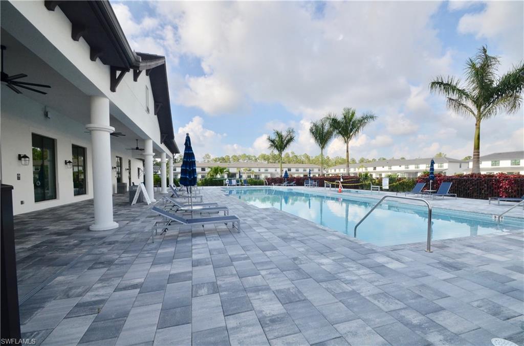 7509 Carnegie Way Naples, FL 34119 - Photo 31 of 33 a view of outdoor space with seating area
