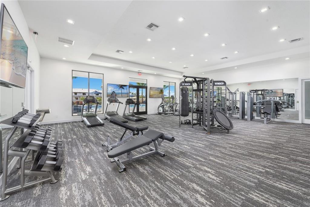 7509 Carnegie Way Naples, FL 34119 - Photo 33 of 33 a view of a room with gym equipment