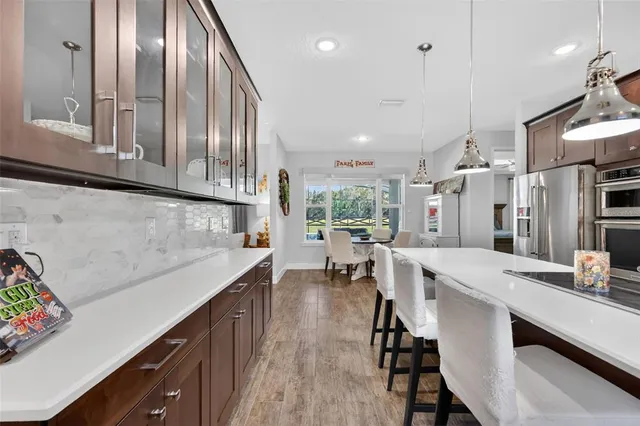 a bedroom with a bed couch and window