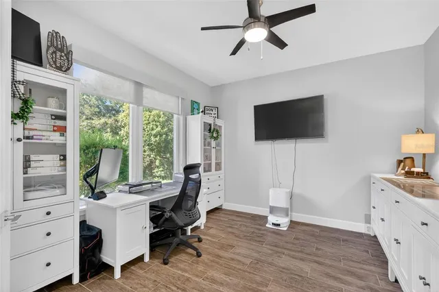a view of a swimming pool with a patio