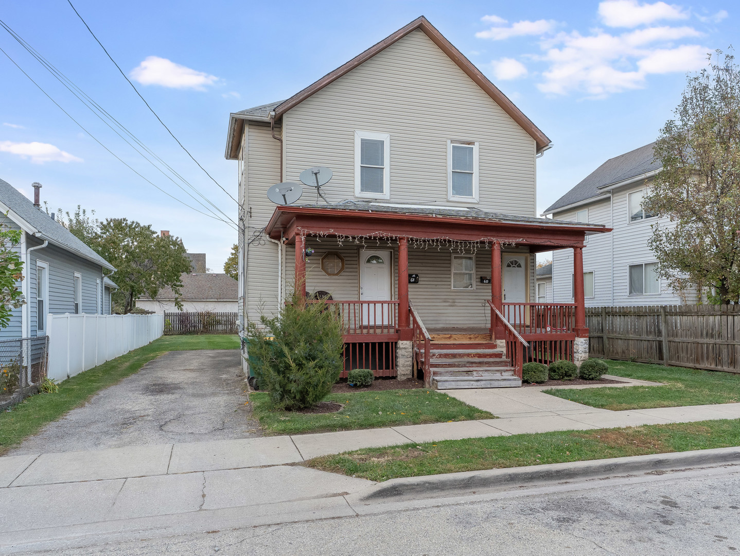 611 Jerome Avenue Joliet, IL 60432 - Photo 17 of 17 a front view of a house with a yard