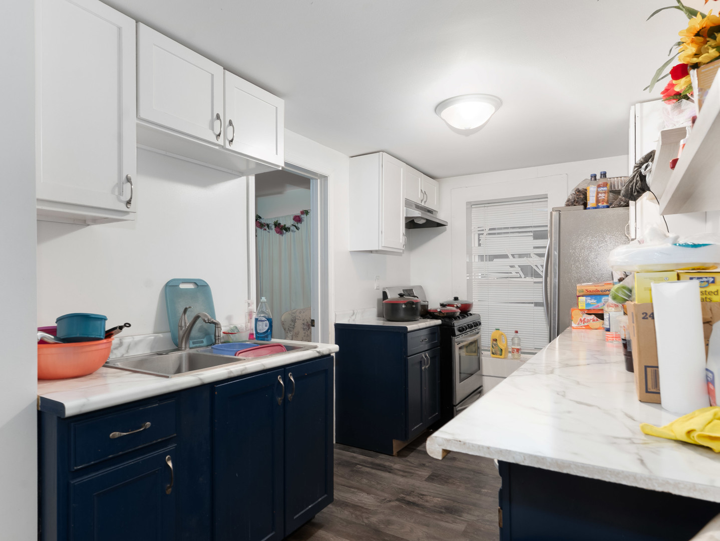 611 Jerome Avenue Joliet, IL 60432 - Photo 10 of 17 a kitchen with a sink appliances and cabinets
