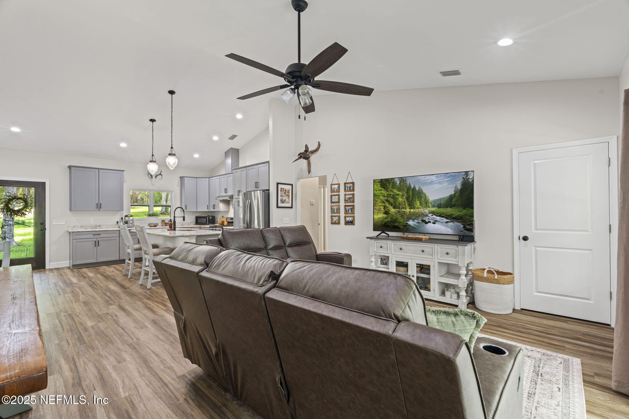 1540 Baden Powell Road Hawthorne, FL 32640 - Photo 25 of 48 Living room leading to 2 bedrooms