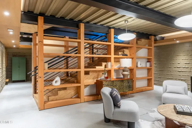 a view of a room that has a washer and dryer