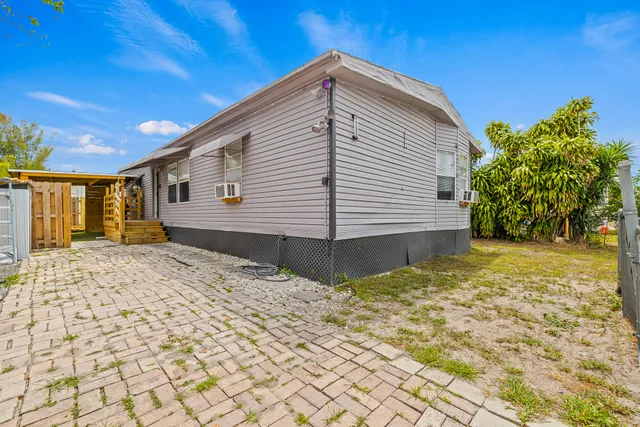 $280,000 | 10592 Southwest Sandalfoot Boulevard, Boca Raton, FL 33428