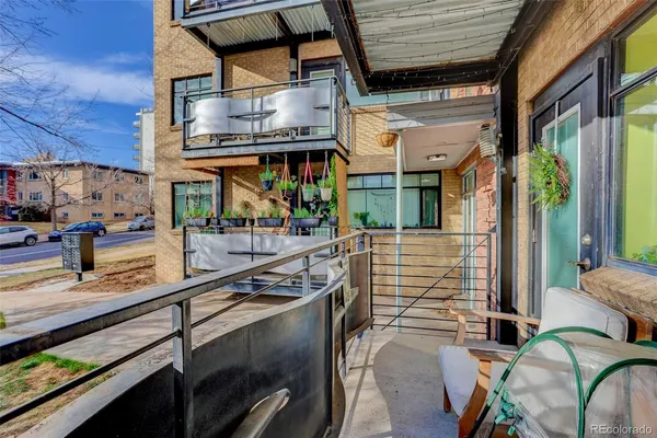 a view of a building with sitting area