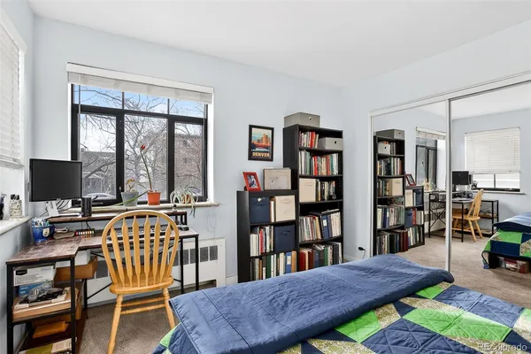 a view of a livingroom with furniture and window