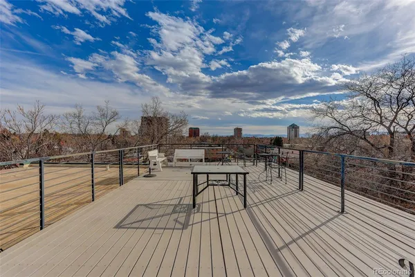 a view of a chairs and table on the terrace