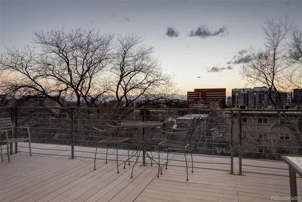a view of house with outdoor space and sitting area