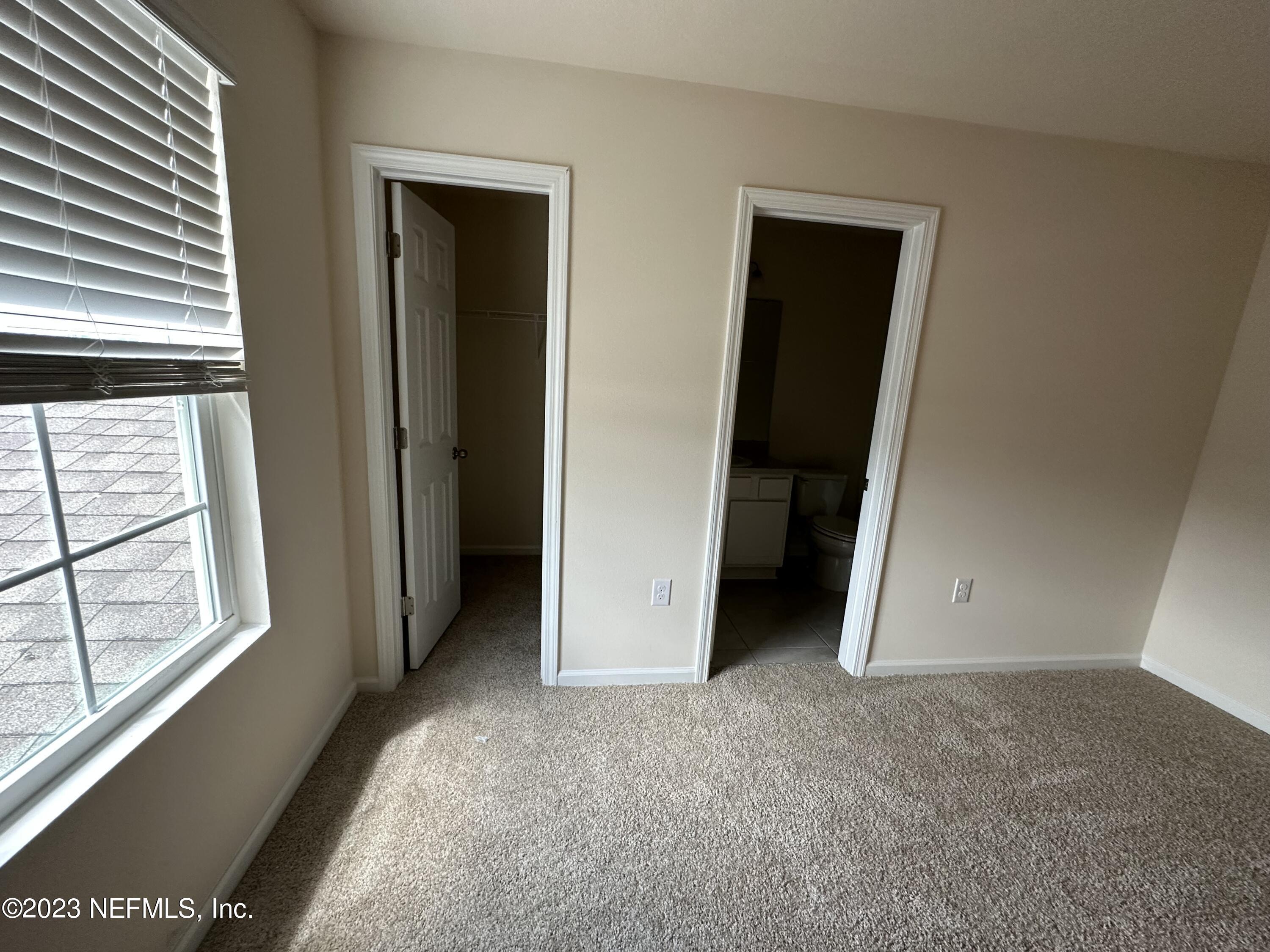 110 Java Lane St. Augustine, FL 32092 - Photo 12 of 23 J ROOM 2 WITH BATH AND WALKING CL