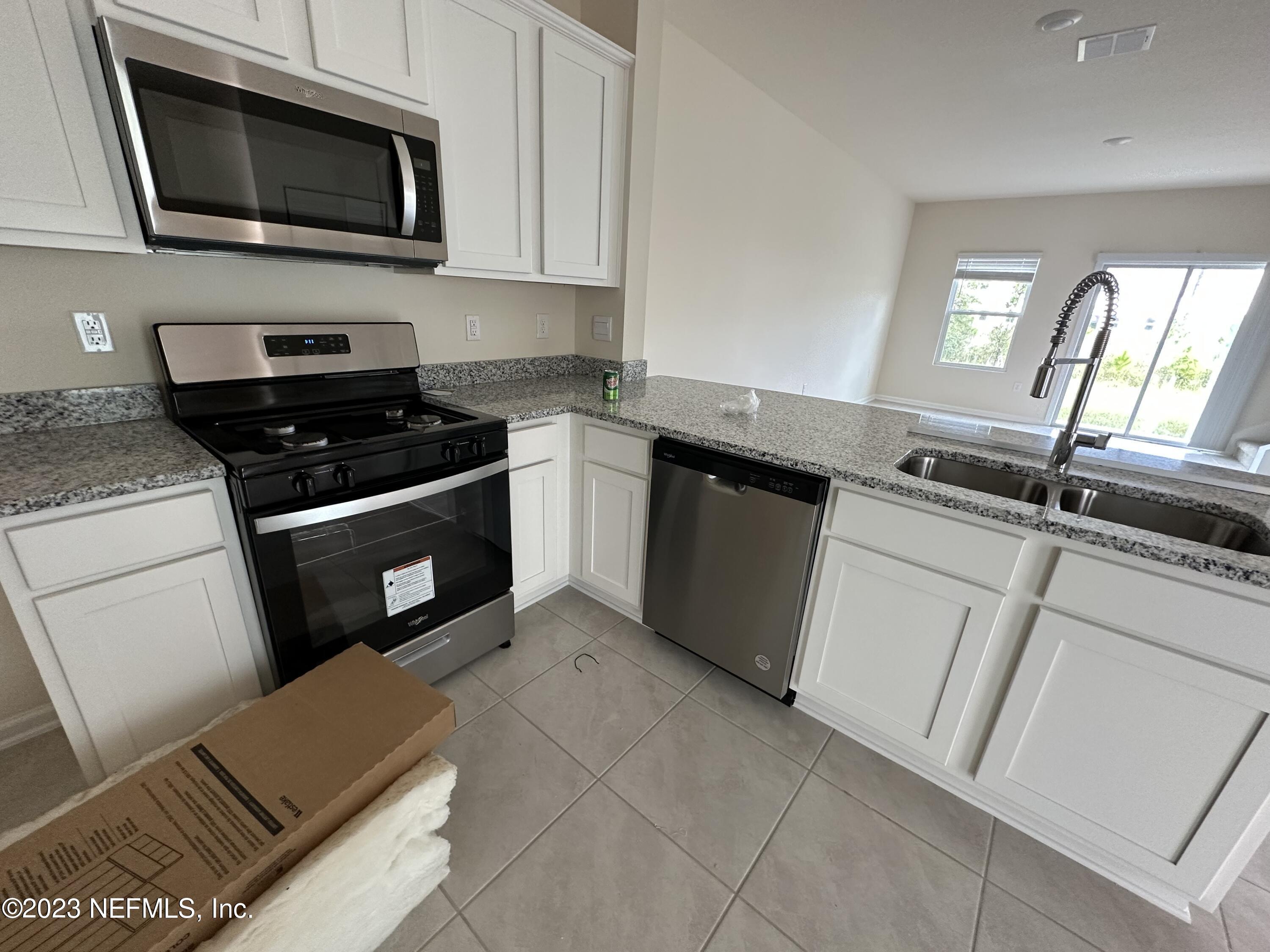 110 Java Lane St. Augustine, FL 32092 - Photo 7 of 23 E KITCHEN