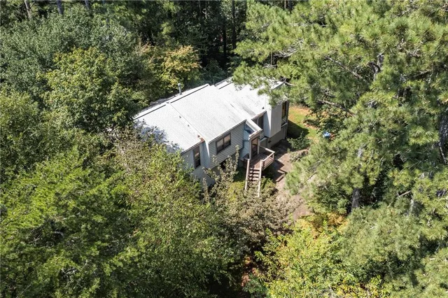 view of a house with a tree