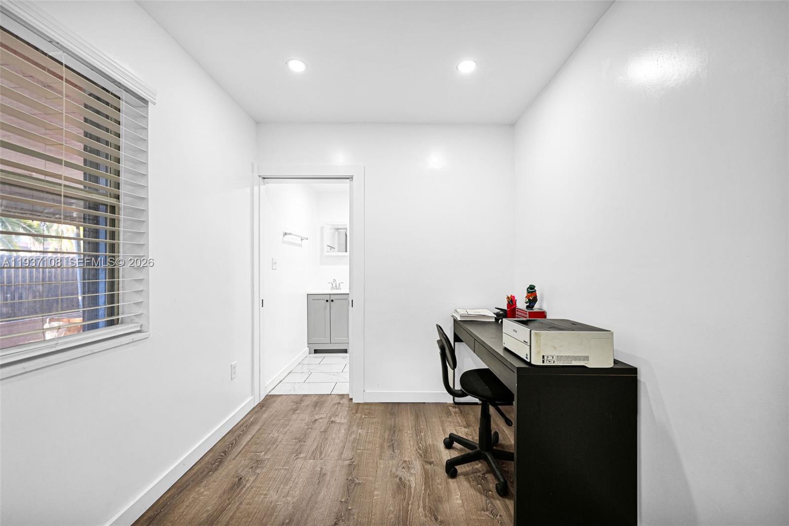 17020 Southwest 149th Avenue Miami, FL 33187 - Photo 23 of 68 a workspace with furniture and window