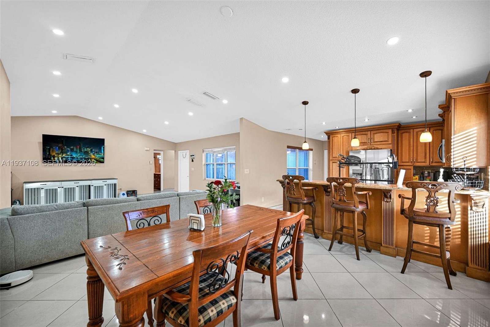 17020 Southwest 149th Avenue Miami, FL 33187 - Photo 50 of 68 a view of a dining room with furniture