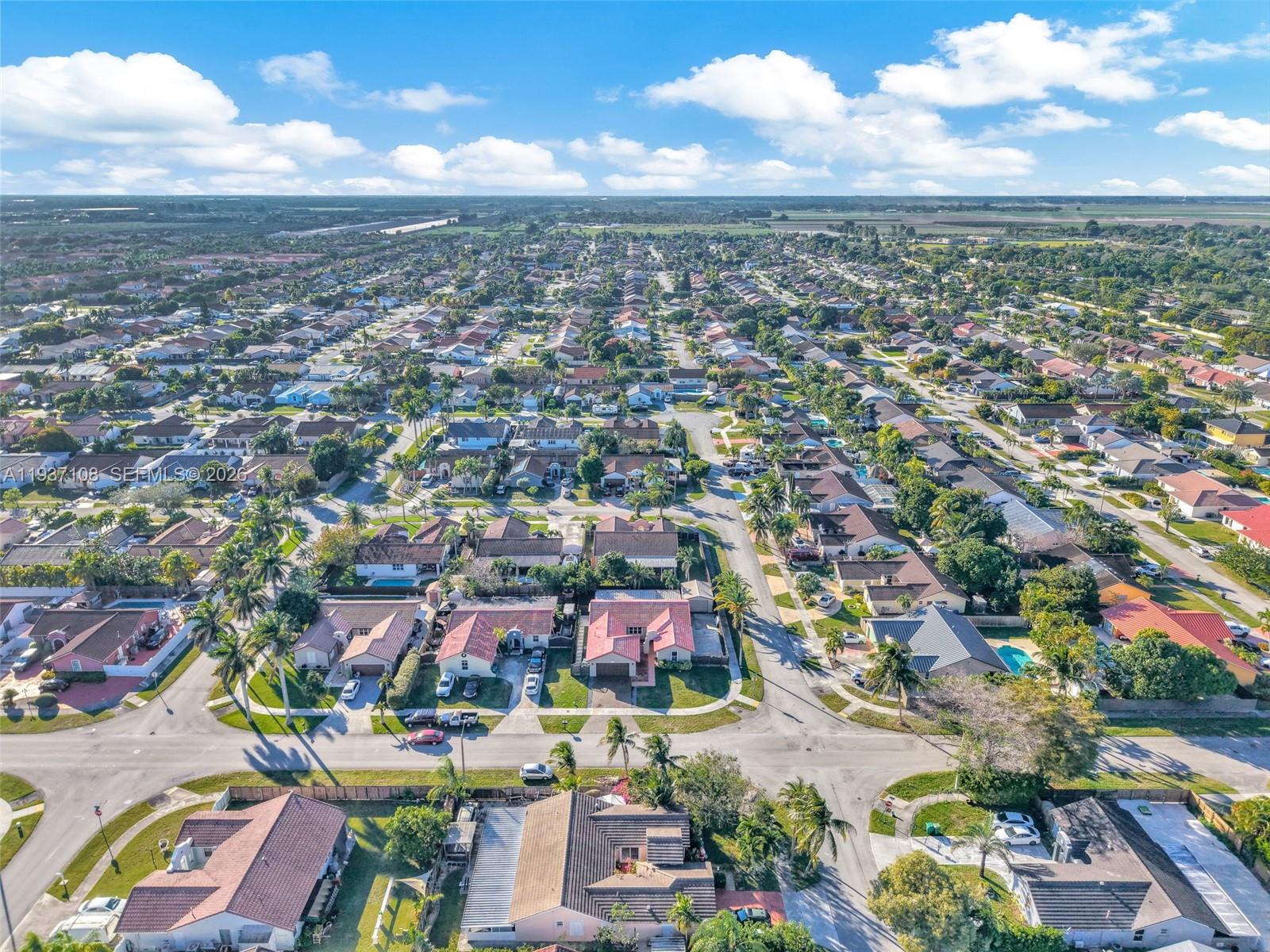 17020 Southwest 149th Avenue Miami, FL 33187 - Photo 64 of 68 an aerial view of a city
