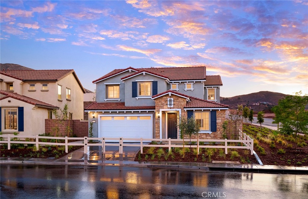 a front view of a house with lake view